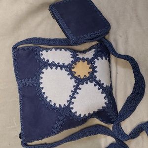Blue suede faux and crocheted  crossbody bag,with attached change purse,…